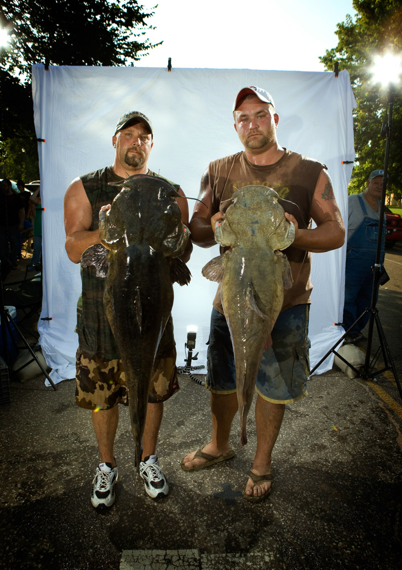 Okie Noodling contestants with their giant catfish. 
