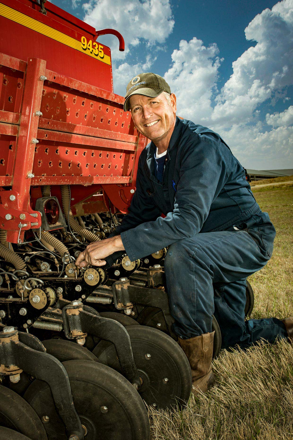 Dairy farmer with machinery, shot for Massey Ferguson.  Brett Deering Photography