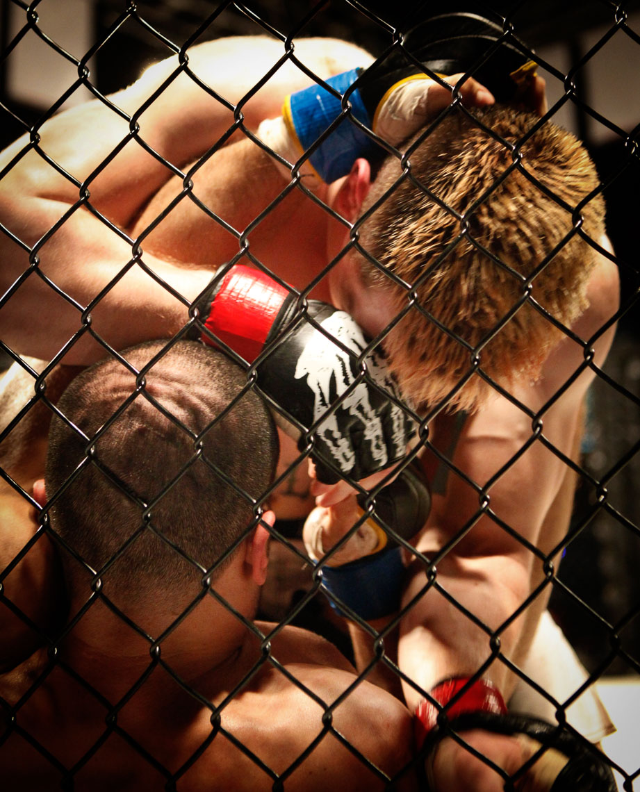 Mixed martial artists in the octagon. Brett Deering photography