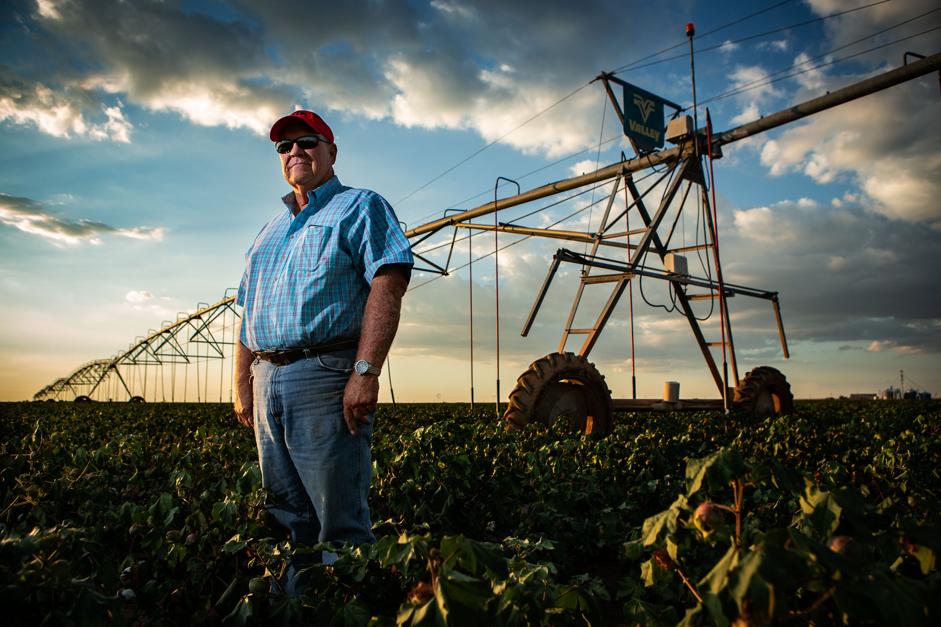 Cotton farmer in North Texas near his irrigation pivot. Brett Deering Photography